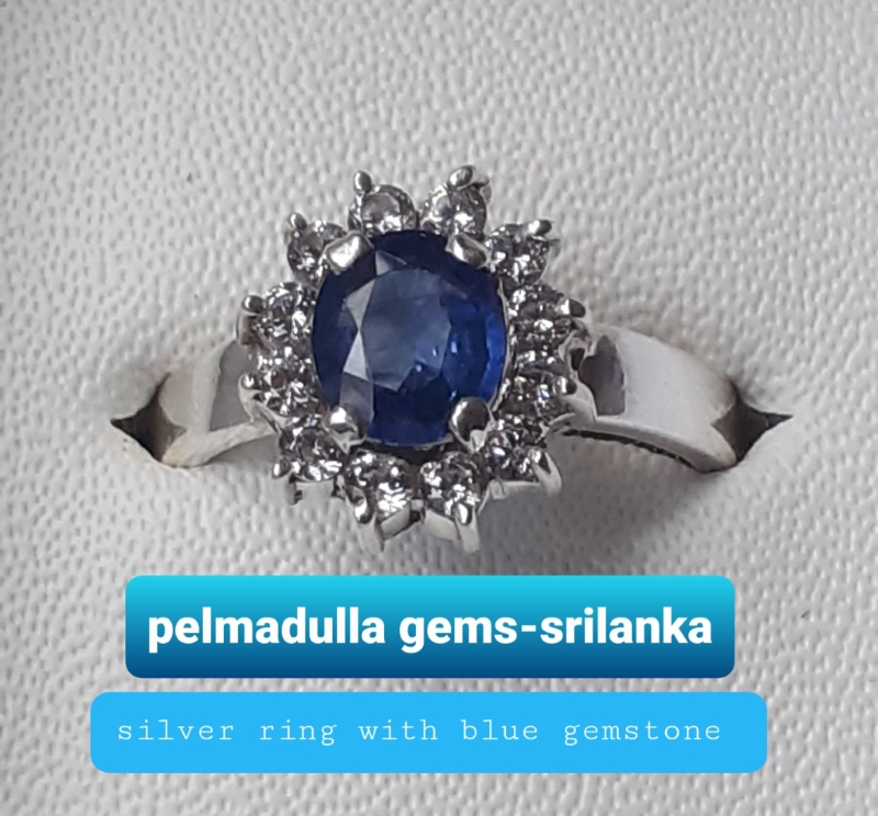 Silver ring with blue gemstone 